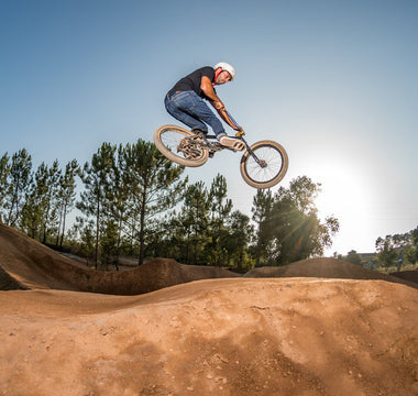 TrackTack® Soil Tackifier and Stabilizer for BMX race tracks, bike parks, trails, & pump tracks.