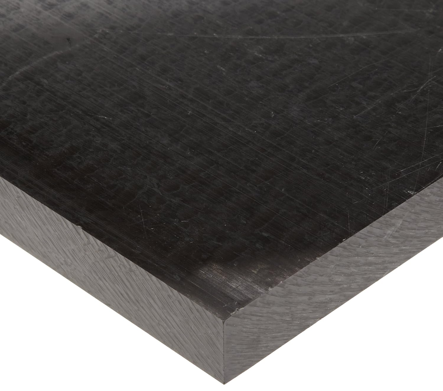 Corner of a sheet of Acetal Plastic