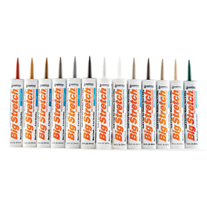 A range of Big Stretch caulk tubes in various colors aligned side by side.
