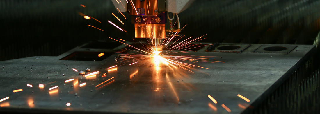 
Laser cutting equipment working on a sheet
