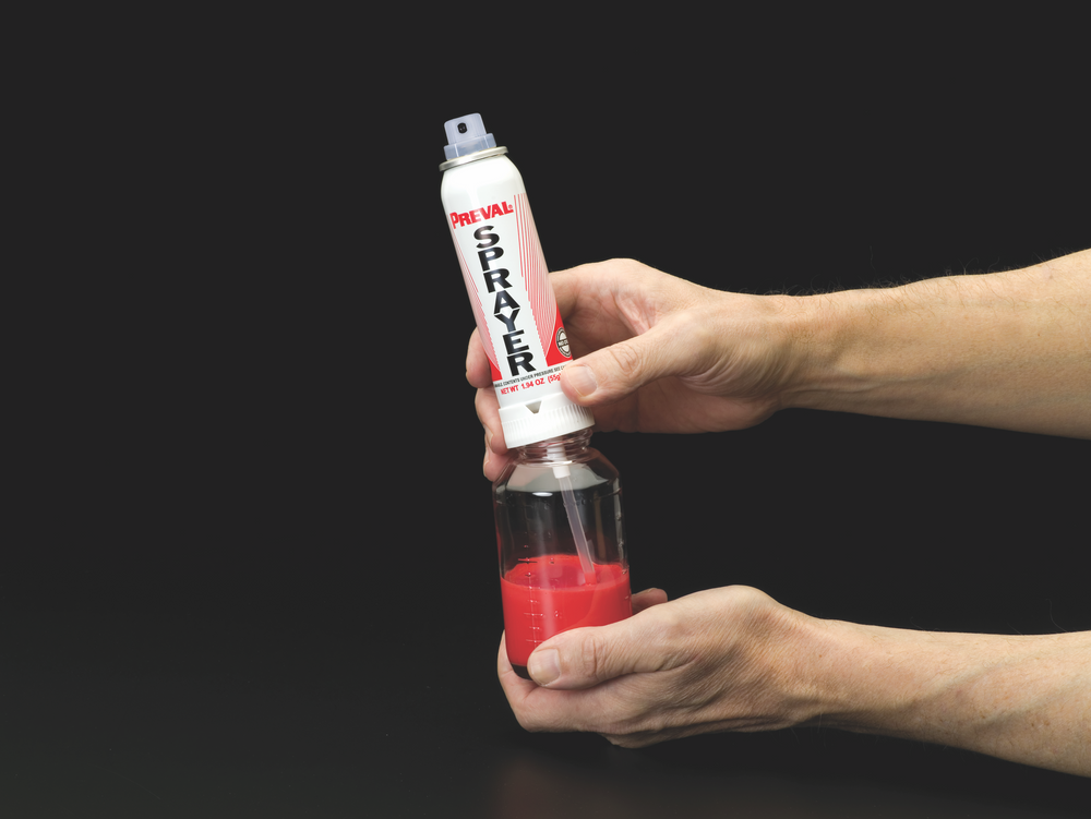 Attach the Preval aerosol power unit to the product reservoir