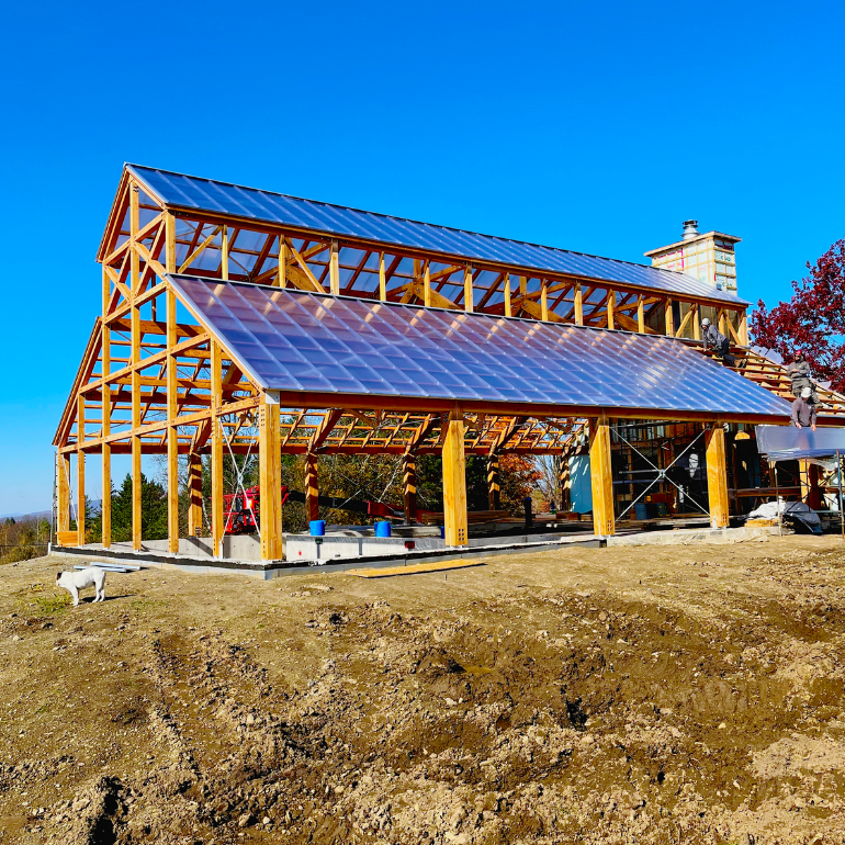 Timber roof structure during installation of clear 25 mm Gallina PoliCarb panels